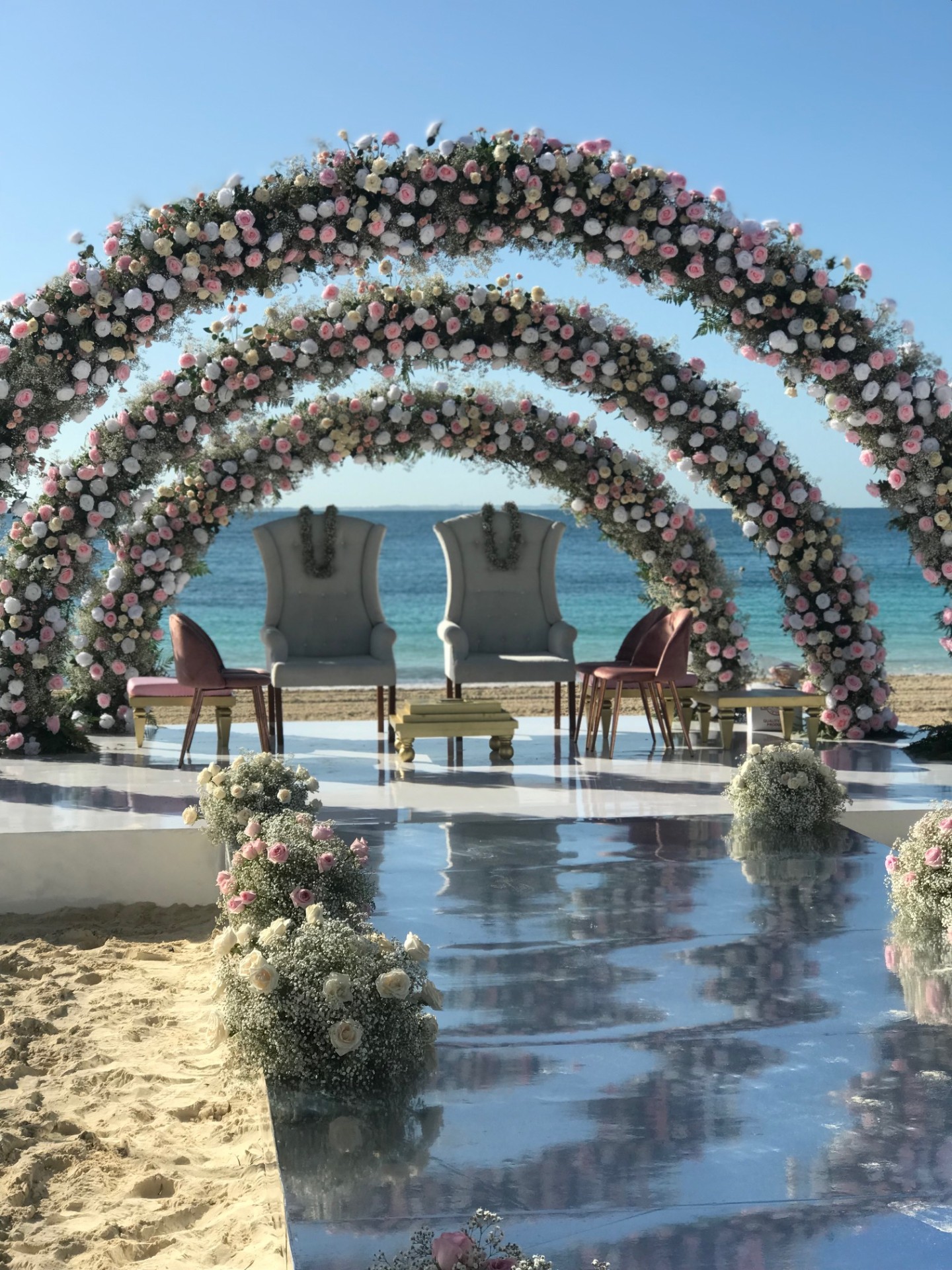 Triple Rose Arch Beach Ceremony
